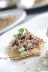 Meat toast with radishes, cucumber and cilantro.