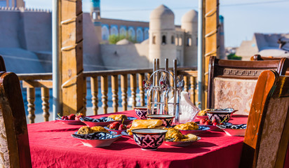 Traditional Uzbek breakfast served on the terrace