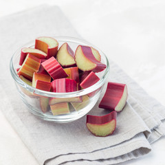 Cutted rhubarb in a glass dish, square format
