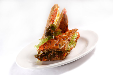 A sandwich club, also called a clubhouse sandwich, is a sandwich of bread, sliced ​​cooked...