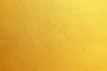 Fototapeta premium Golden textured wall for background and luxurious graphic design purpose
