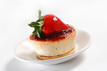 Cheese pie with strawberries and walnut.