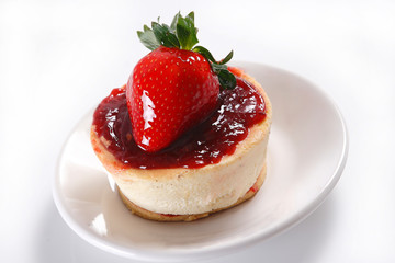 Cheese pie with strawberries and walnut.