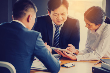 businessmen brainstorming for strategy of business investment,businessmen review chart and document of investment information