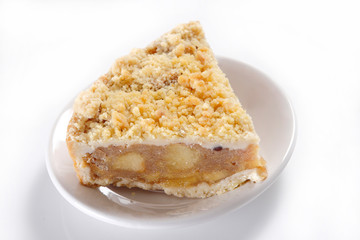 Baked apple pie with walnut and peanuts.