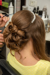 Fototapeta premium the bride at the hairdresser,Beautiful Hairstyles for wedding/party |,Simple Hairstyles |