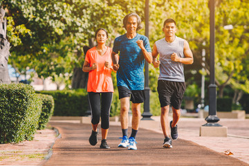 Obraz premium people runner running on running road in city park