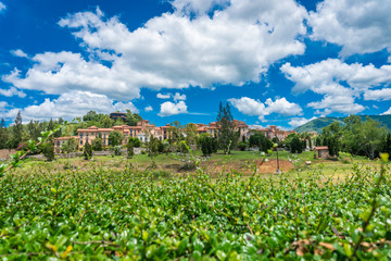 Fototapeta na wymiar Beautiful romantic of Venetian-style Italian village landscape on mountain with blue sky and cloud background in Thailand. Timelapse