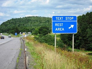 Text Stop Rest Area sign fights distracted driving by offering a safe stop for texting