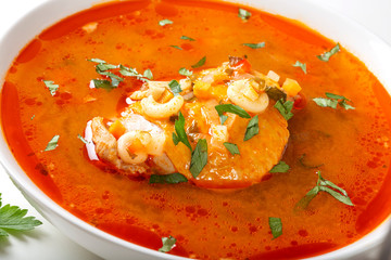 Chicken soup with tomato sauce