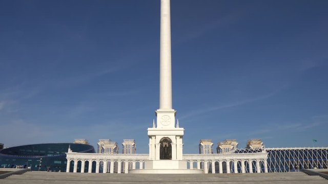  Nur-Sultan Astana Monument Kazakh Eli Pillar Frontal View on a Sunny Cloudy Blue Sky Day