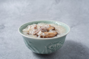 A bowl of nutritious and delicious mushroom lean meat porridge