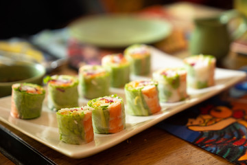 colorful spring rolls on a white plate in Vietnam
