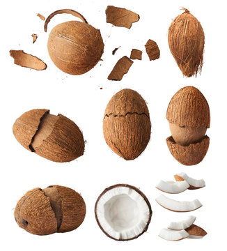 Set with Fresh raw coconut with palm leaves isolated on white background. High resolution image