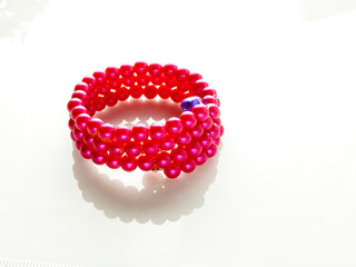Multi-colored bracelets with beads. Colourful child's bead bracelet.