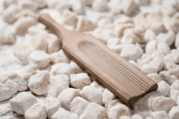 Dough of handmade gnocchi and cooking elements
