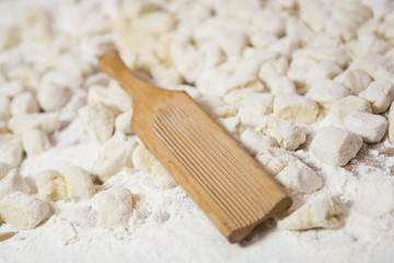 Dough of handmade gnocchi and cooking elements