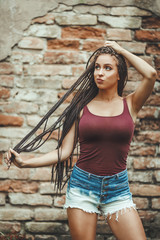 Pouting Young Woman With Afro Braids Hairstyles