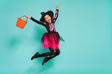 little witch on turquoise background