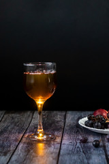 Amber wine. Wine in a glass. Traditional Georgian wine according to ancient technology. Close up