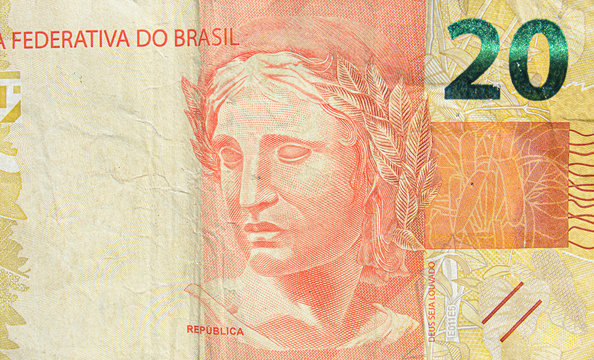 Brazilian twenty real banknote. Yellow note, 20 reais brl. Brazilian money, real note. Macro photo.