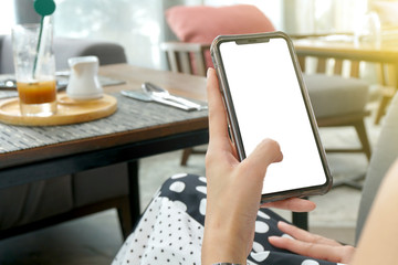woman working on tablet computer at home