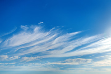 beautiful blue sky with soft cirrus clouds for background - obrazy, fototapety, plakaty