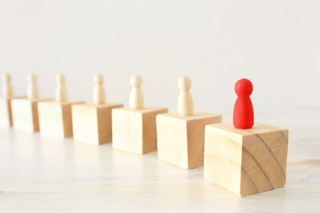 business concept image of people figures over wooden table, human resources and management concept