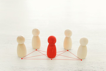 Obraz premium business concept image of people figures over wooden table, human resources and management concept