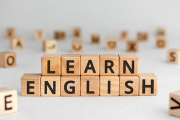 Learn English - words from wooden blocks with letters, learn how to speak English concept, random...