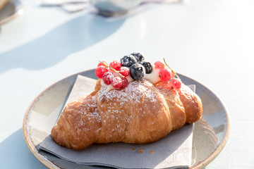 Creamy croissant with berries