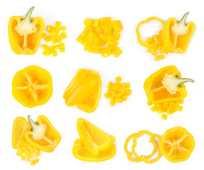 Set of cut ripe yellow bell peppers on white background, top view