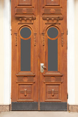 Big vintage wooden door of old building