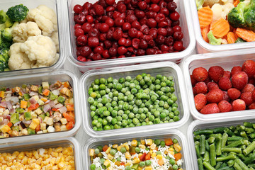 Boxes with different products as background, above view