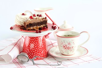 cup of tea and cake on white background