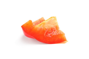 Slice of ripe red bell pepper on white background