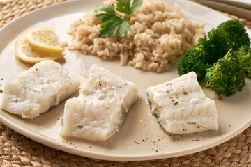 Steamed cod with brown rice and vegetables, dash fodmap diet side view