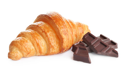 Tasty croissant with chocolate on white background. French pastry