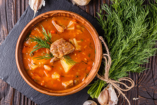 Chanahi a traditional Georgian meat stew in a bowl on stoyn board