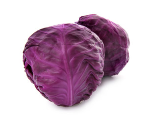 Whole ripe red cabbages on white background
