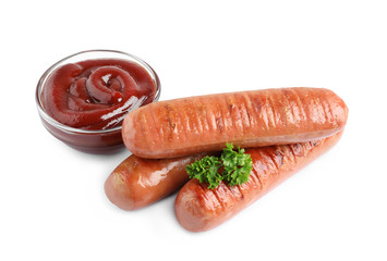 Delicious grilled sausages and sauce on white background. Barbecue food