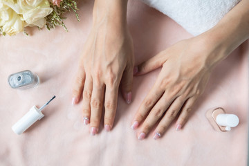 Obraz na płótnie Canvas Beautiful manicure nails paint with glitter and varnish in nail salon