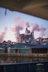 Smoke coming from the chimneys of a cellulose plant. Swedish port.