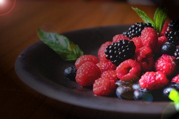 fresh and healty raspberry on dish ready to eat
