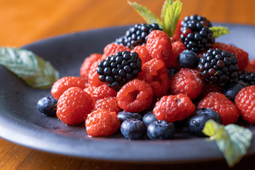 fresh and healty raspberry on dish ready to eat