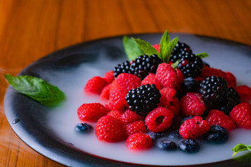 fresh and healty raspberry on dish ready to eat