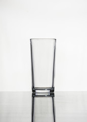 empty glass of water on black background