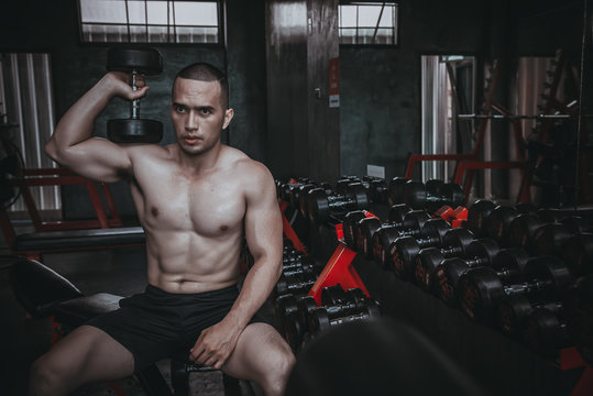 Portrait of asian man big muscle at the gym,Thailand people,Workout for  good healthy,Body weight training,Fitness at the gym concept 10452831 Stock  Photo at Vecteezy