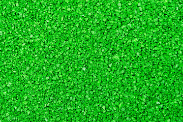 Green textural background. Lawn surface or fine texture for a playground.