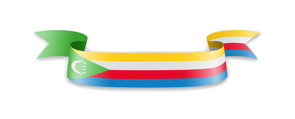 Comoros flag in the form of wave ribbon. Vector illustration.